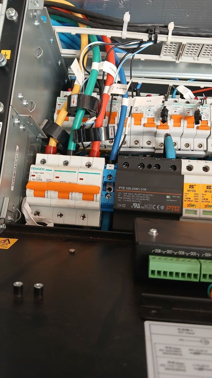 Breaker row with surge protection devices
